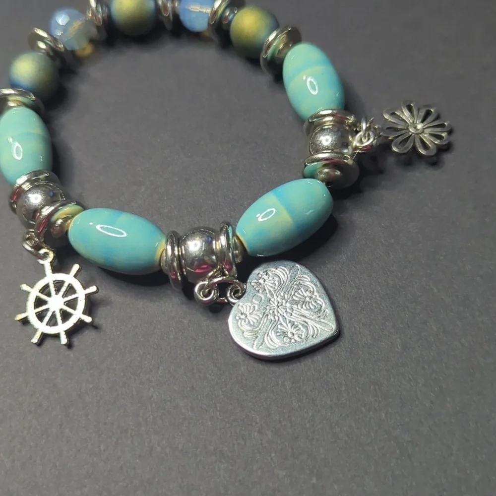 ❤️5/$25 Silver and Blue Charm Bracelet